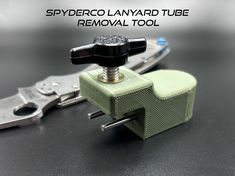 there are two different types of tools on the table with text overlay that reads, spydero lanyard tube removal tool