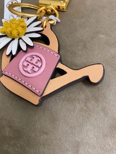 Tory Burch Women's Garden Pail Keychains & Bag Charms 87913 251 Logo Charm Bag For Everyday Use, Brown Bag Charm For Everyday Use, Brown Everyday Use Bag Charm, Bag Charms, Keychains, Tory Burch, Enamel Pins, Charms, Closet