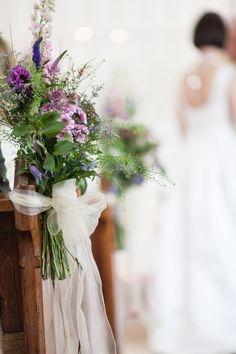 the bride and groom are getting ready to walk down the aisle