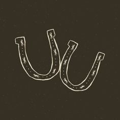 the word u is drawn in chalk on a blackboard with white stars around it