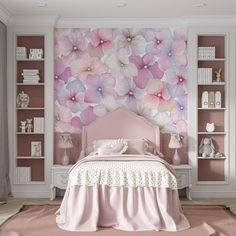 a bedroom decorated in pink and white with flowers on the wall