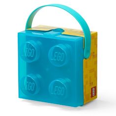 a blue lego lunch box with two handles