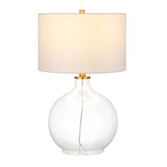 a glass table lamp with a white shade on it's base and a gold - plated metal base