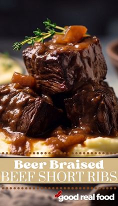 beef short ribs on top of mashed potatoes with gravy