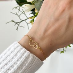 Celebrate the beautiful, unbreakable bond between a mother and her daughter with our Double Heart Bracelet, featuring elegantly interlocking hearts. This symbolic piece represents the deep connection and love shared, making it a perfect gift for both moms and daughters. Comes with a Mother & Daughter card - if you would like to remove it or change it - please let us know.  Create a wonderful set and purchase two bracelets - one for Mum, one for daughter.  ITEM DETAILS: ∙ Available in premium 925 Elegant Heart Charm Bracelet For Mother's Day, Elegant Heart Bracelet For Mother's Day Anniversary, Elegant Adjustable Heart Bracelet As Gift, Double Heart Bracelet Valentine's Day Gift, Double Heart Bracelet For Mother's Day, Adjustable Heart Bracelet For Valentine's Day Wedding, Adjustable Open Heart Bracelet For Mother's Day, Adjustable Open Heart Bracelet For Gift, Adjustable Open Heart Bracelet Gift