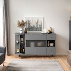 a living room with a gray entertainment center