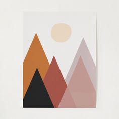 a card with mountains and the sun in the sky on it's back side