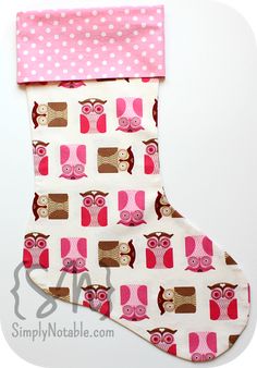 a pink and brown stocking with owls on it