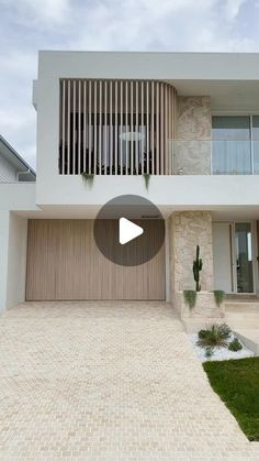 a white house with an open garage door