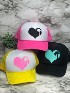 "These unique custom MADE TO ORDER hats are truely one of a kind. Not all heads are created equal , which is why we have so many size options. You can customize your hat color, size and your favorite design. please note all hat colors vary by size, in other words- not every hat color is available in every size. **please note these are made to order and the design layouts will be unique to each hat ordered** Please feel free to ask any questions you have about sizing, as these are MADE TO ORDER e Cute Multicolor Hats For Vacation, Cricut Hat Ideas Women, Cricut Visor Ideas, Cute Beach Hats With Flat Brim, Beach Trucker Hats For Women, Cute Flat Brim Beach Hats, Cruise Hats, Fun Curved Brim Snapback Hat For Vacation, Cute Vacation Cap