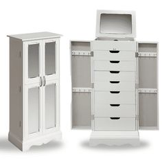 two tall white cabinets with drawers and doors