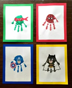 four handprints with different designs on them, one is for spiderman and the other