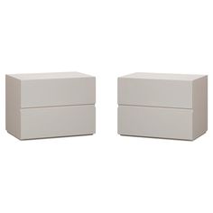 two white boxes sitting next to each other