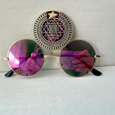 💓Third eye statement sunglasses by Alexis Exclusive  💓This quirky pair of Third Eye Sunglasses are the perfect unusual accessory if you love something different. 💓The three lenses are gold metal and they have mirrored pink lenses. In the centre lens they have a large metal silver Sri Yantra meditation embellishment. 💓Great for festivals, carnivals, holidays, or everyday wear if that's your thing 😉 💓UV protection. 💓Exclusive design made by myself, you won't see any others like these anywhere else. 💓All my glasses come in a black pouch to keep them safe, please also handle with care. 🖤Checkout the full collection of Sunglasses here :  https://www.etsy.com/uk/shop/AlexisExclusive?ref=s2-header-shopname 🖤To be kept up to date with new designs please FAVORITE MY SHOP. 🖤All Alexis Exc Third Eye Sunglasses, Statement Sunglasses, Pink Lenses, Black Pouch, Sri Yantra, Third Eye, Eyewear Sunglasses, Uk Shop, Exclusive Designs