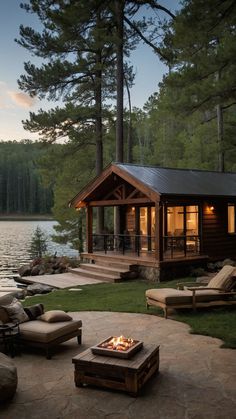 an outdoor fire pit in front of a cabin