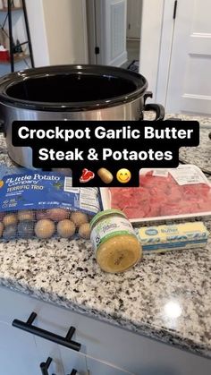 crockpot garlic butter steak and potatoes are on the kitchen counter next to an instant pot