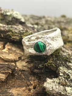 This hand-created reticulated sterling silver (.925) wide band ring features a beautiful round natural malachite gemstone. This ring is a size 6.5.  Malachite absorbs negative energies and pollutants. It clears and activates the chakras and attunes to spiritual guidance. It opens the heart to unconditional love. All my creations have been designed and handmade with collected and imported materials from all over the world. My metals and gemstone beads have been carefully selected for the best pre Malachite Ring, Mount Airy, Malachite Rings, Wide Band Ring, Good Presentation, Wide Band Rings, Spiritual Guidance, Unconditional Love, Wide Bands