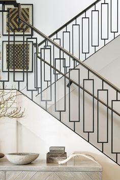 the stairs in this house are black and white