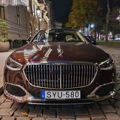 a car parked on the street at night