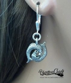 "I love these adorable Silver Pisces Earrings! The 3D charm has so much detail with two fish with sucker style mouths, eyes, scales, back fins and tail fins. It measures 1/2 inches long and 5/8 inches wide from tail fin to tail fin. It's made in the USA using lead free pewter. The leverback earwire is sterling silver with a tear drop accent. These lovely are ready to ship and will arrive in a gift box. View other BrattonCraft Zociac Jewelry here: https://www.etsy.com/shop/BrattonCraft?ref=listin Pisces Earrings, February Zodiac, Pisces Jewelry, Irish Earrings, Zodiac Earrings, Celtic Circle, Celtic Knot Jewelry, Winter Necklace, Celtic Knot Necklace