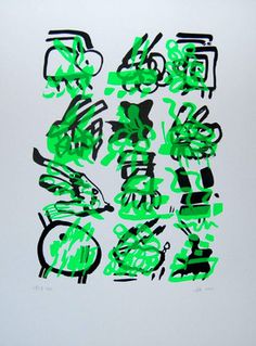 green and black ink on white paper with chinese characters in the middle, all over it