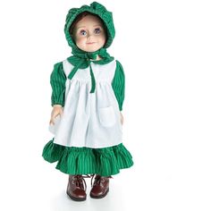 a doll dressed in green and white with a hood on it's head is standing