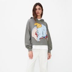 Relaxed Fit Retro Streetwear Authentic Zara Official Disney Collab Dumbo Hoodie/Sweatshirt -The Official Zara Disney Dumbo Hoodie From Their Recent Collaboration Is A Playful & Stylish Addition To Your Wardrobe -Featuring A Hood, Long Sleeves, Ribbed Trim At Sleeves & Hem And Of Course The Standout Feature Is The Smiling Disney Dumbo Print On The Front -Comfortable And Practical For Everyday Wear -Relaxed Fit -Size L -Zara & Disney Tags Attached -This Hoodie Was Very Popular & It’s Become A Little Bit Of A Collector’s Item, This Was The Case With Most Of The Zara Disney Collab Pieces -Main Fabric Is Mostly Comfortable Breathable Cotton -Shoulder To Hem About 20”, They Called This Cropp Zara Disney, Ear Parts, Retro Streetwear, Tie Front Cardigan, Zara Shorts, Sweatshirt Short Sleeve, Striped Tank Top, Red Sweaters, Zara Tops