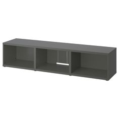 a gray entertainment center with two open shelves