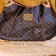 Louis Vuitton Brown And Tan Large Shoulder Bag, Clean Tan Cloth Interior, Slightly Worn Shoulder Strap, Gold Hardware, Protective Legs. Protective Bag Included. Louis Vuitton Vintage, Bags Louis Vuitton, Vintage Monogram, Louis Vuitton Brown, Large Shoulder Bags, Vintage Louis Vuitton, Louis Vuitton Bags, Gold Hardware, Louis Vuitton Bag