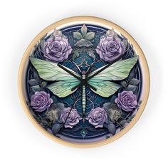 a clock with flowers and a butterfly on it