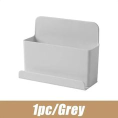 an image of a white paper holder with the words 1 pc / grey on it