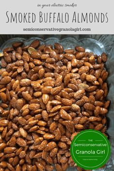 smoked buffalo almonds in a glass bowl with the words smoked buffalo almonds on top