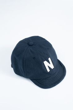 These are quite the staple accessory at the shop now. From the short brim to the fact that they're lightweight and breathable, they were an instant yes. They have a classic baseball brim style, but nothing about these is classic. They are using modern techniques to weave the fabric from which this style is born. This is their iconic "Back Nep" fabric which has a ton of fleck and character. You can now wear back nep from head to toe. 100% Cotton Leather Closure Produced in Jackman factory in Fukui prefecture table { border-collapse: collapse; width: 100%; } th, td { border: 1px solid black; padding: 8px; text-align: center; } Size Around the Head One Size 22.44-26.38" A variance of +/-.5" is within tolerance. Fit Notes: These have a one-size notation, but they probably wouldn't be the best Sporty Short Brim Hat For Streetwear, Classic Six-panel Snapback Hat, Classic Snapback Hat With Curved Brim For Sports, Classic Six-panel Trucker Hat, Classic Baseball Cap, Sporty Everyday Baseball Cap With Flat Bill, Sporty Everyday Snapback Baseball Cap, Classic Six-panel Dad Hat, Classic Short Brim Baseball Cap For Streetwear