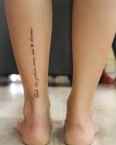 a person's foot with the words in spanish and english on their left side