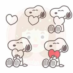 some cute little dogs with hearts in their mouths