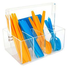 plastic utensils and spoons are in a clear holder on a white background