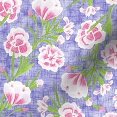 a purple and pink flowered fabric with green stems on it's side,