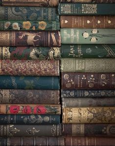 a stack of old books sitting next to each other