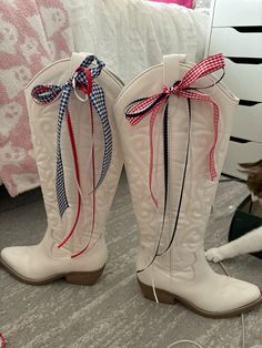 White cowgirl boots with red and navy ribbon Ribbon On Boots, Blue Cowgirl Outfit, White Cowgirl Boots, Cowgirl Outfit, Navy Ribbon, Cowgirl Outfits, Dream Shoes, Country Outfits