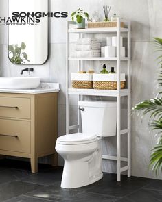 a white toilet sitting in a bathroom next to a wooden shelf filled with towels and plants