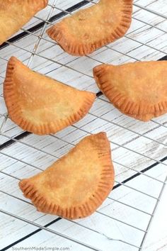 several pastries cooling on a wire rack