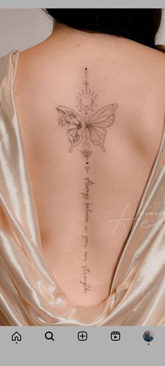 the back of a woman's neck with a butterfly tattoo on it