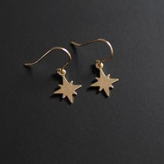 14/20 gold-filled hooks and tiny 18k gold-plated stars. So dainty! Total length including hook is 1" Streetstyle Hairstyle, Jewelry Design Inspiration, Tiny Star, North Star, Star Earrings, Ring Bracelet, Earring Necklace, Clay Earrings, Pay Attention