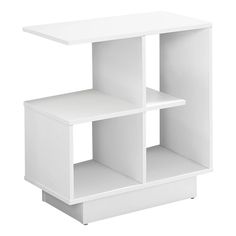 a white shelf with three shelves on one side and an open drawer on the other