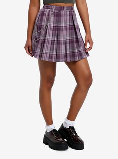 Plaids for spring? We're into it. This pleated mini skirt is a light purple and lavender plaid  and comes with a removable waist chain. 95% polyester; 5% spandexWash cold; dry lowLength: 18"ImportedListed in junior sizesModel is 5'9"Model wears size Small Trendy Plaid Mini Skirt For Spring, Trendy Mini Length Plaid Pleated Skirt, Trendy Mini Plaid Pleated Skirt, Casual Purple Mini Skirt For Fall, Purple Pleated Mini Tennis Skirt, Purple Mini Tennis Skirt For Spring, Purple Mini Skirt For Fall, Plaid Mini Skirt For Spring, Casual Purple Pleated Mini Skirt