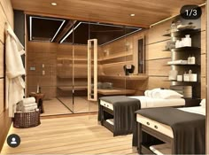 two beds in a room with wooden walls