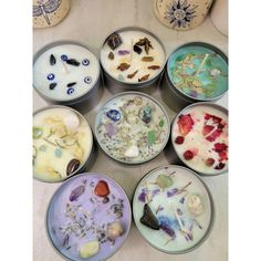 several bowls filled with different types of paint