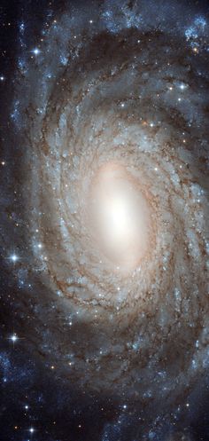 a spiral galaxy with stars in the background