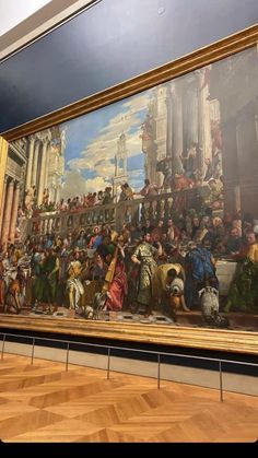 a large painting on display in a museum