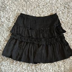 Brand New And Never Worn Black Skirt! Black Coquette Skirt, Frilly Black Skirt, Whimsigoth Mini Skirt, Trendy Black Ruffled Mini Skirt, Trendy Black Tiered Mini Skirt, Trendy Black Mini Skirt With Ruffles, Trendy Black Ruffled Skort, Black Ruffled Mini Skirt For Night Out, Black Pleated Skirt For Day Out